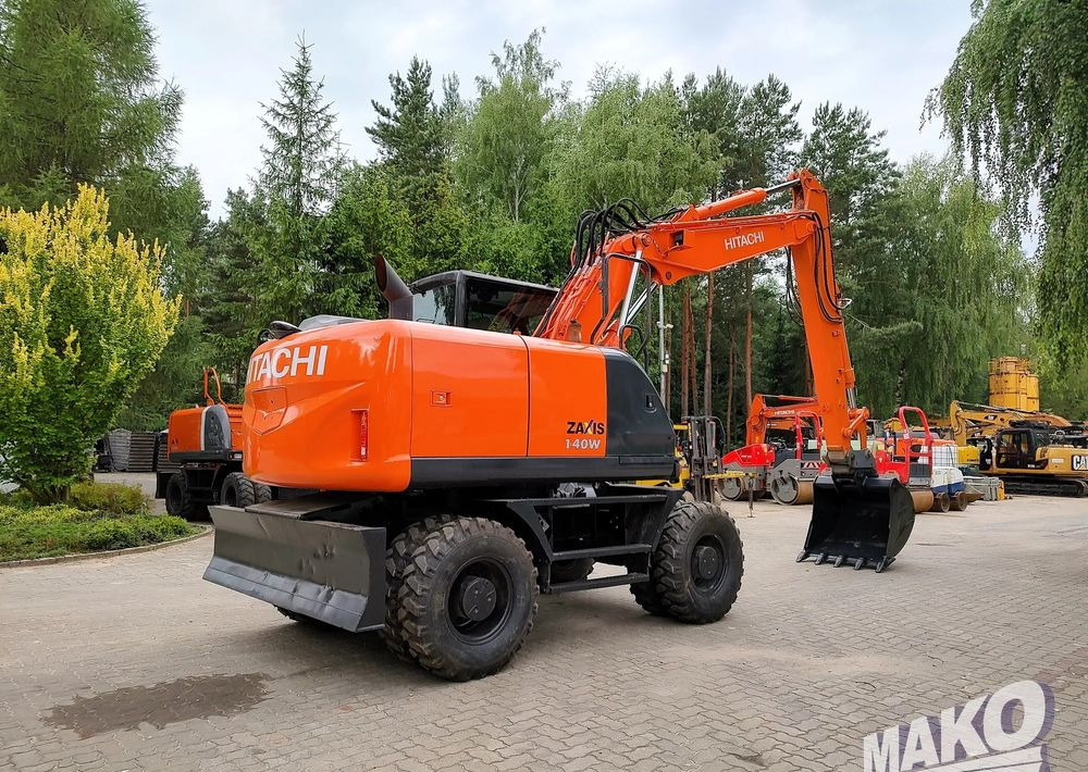 Hitachi ZX 140 - Колесен багер: снимка 4 Hitachi ZX 140 - Колесен багер: снимка 4