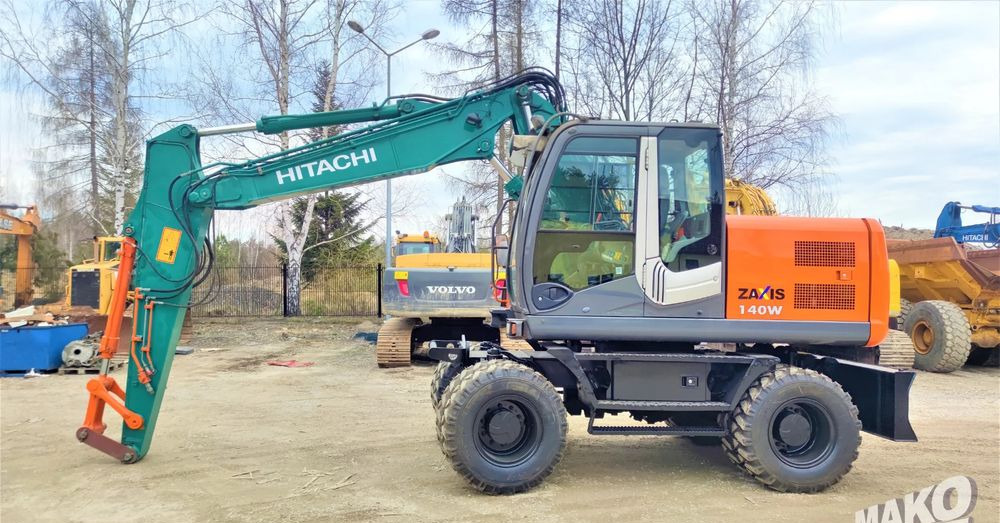 Hitachi ZX140W-3 - Колесен багер: снимка 1 Hitachi ZX140W-3 - Колесен багер: снимка 1