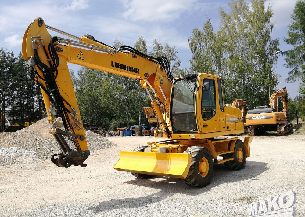 Liebherr A 314 Litronic - Колесен багер: снимка 1 Liebherr A 314 Litronic - Колесен багер: снимка 1