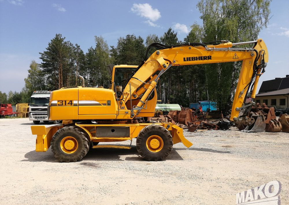 Колесен багер Liebherr A 314 Litronic: снимка 6