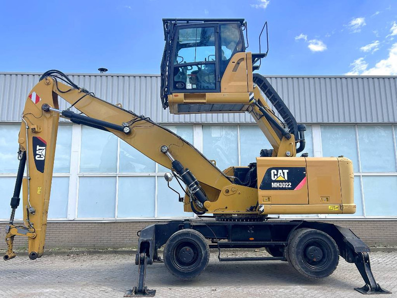 Cat MH 3022 2015 CE - Багер за манипулиране на материали: снимка 1 Cat MH 3022 2015 CE - Багер за манипулиране на материали: снимка 1