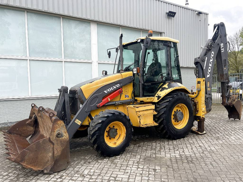 Volvo BL71 CE - Багер-товарач: снимка 1 Volvo BL71 CE - Багер-товарач: снимка 1