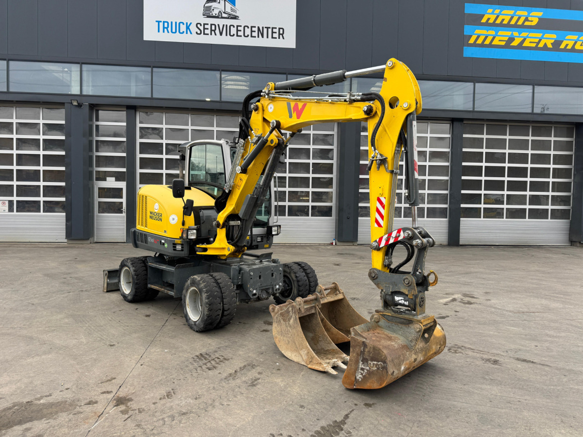 NEUSON EW65 E14-2 Powertilt 3x Schaufeln - Колесен багер: снимка 2 NEUSON EW65 E14-2 Powertilt 3x Schaufeln - Колесен багер: снимка 2