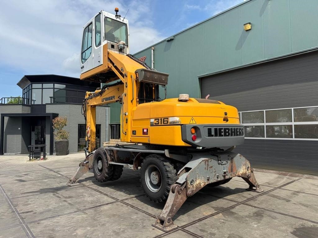 Liebherr A 316 - Багер за манипулиране на материали: снимка 3 Liebherr A 316 - Багер за манипулиране на материали: снимка 3