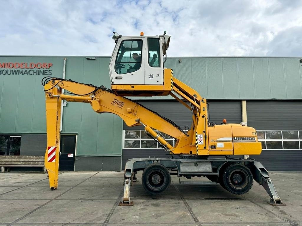 Liebherr A 316 - Багер за манипулиране на материали: снимка 1 Liebherr A 316 - Багер за манипулиране на материали: снимка 1