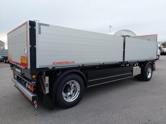 Schwarzmüller 2-Achs Jumbo-Baustoff-Plateauanhänger, BPW-Achsen, Alufelgen, - Бордово ремарке/ Платформа: снимка 4 Schwarzmüller 2-Achs Jumbo-Baustoff-Plateauanhänger, BPW-Achsen, Alufelgen, - Бордово ремарке/ Платформа: снимка 4