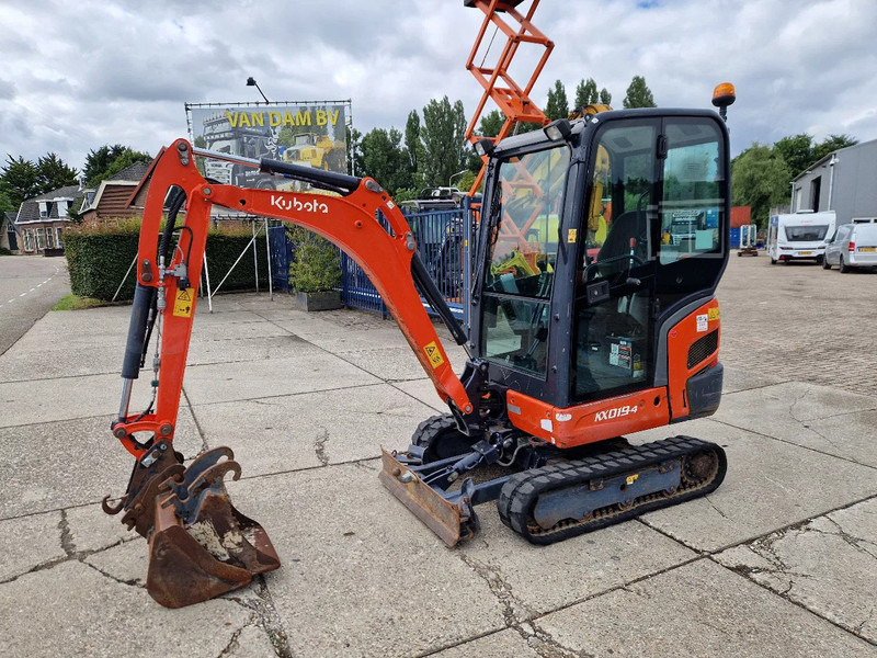 Kubota KX019-4 CW05 met 2 bakken - Мини багер: снимка 1 Kubota KX019-4 CW05 met 2 bakken - Мини багер: снимка 1