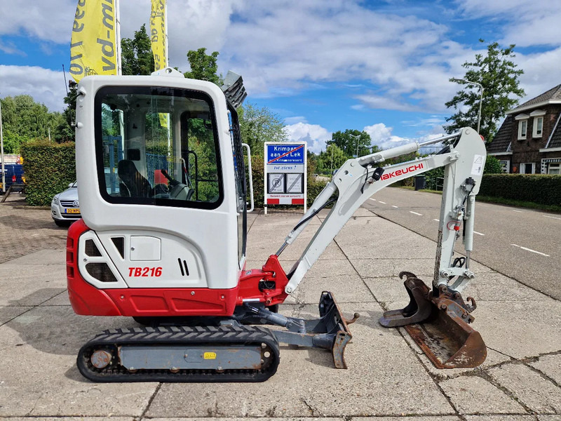 Мини багер Takeuchi TB216 met 2089 uur: снимка 18