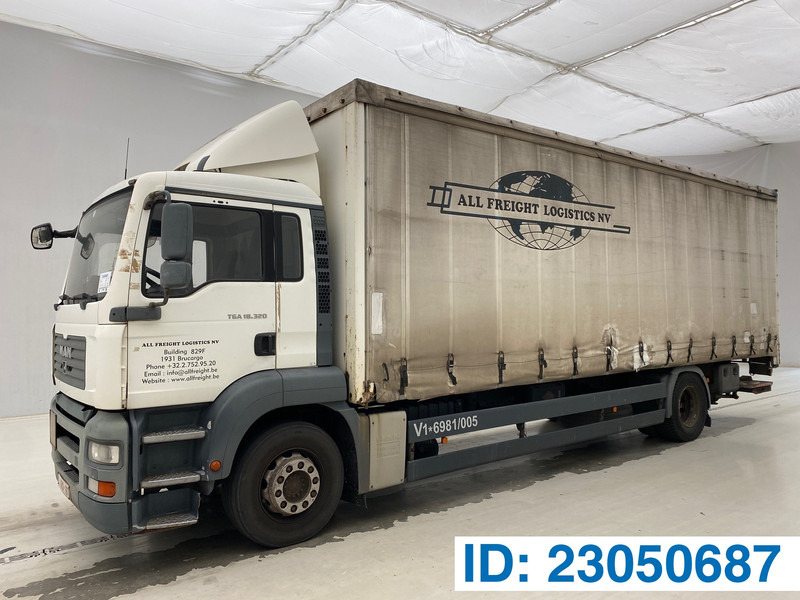 MAN TGA 18.320 - Камион с брезент: снимка 1 MAN TGA 18.320 - Камион с брезент: снимка 1