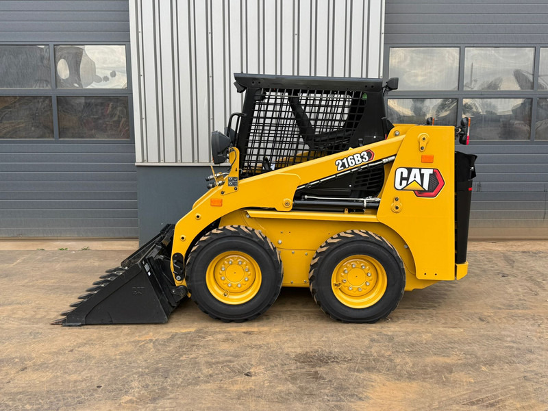 Caterpillar 216B3 - Колесен товарач: снимка 1 Caterpillar 216B3 - Колесен товарач: снимка 1