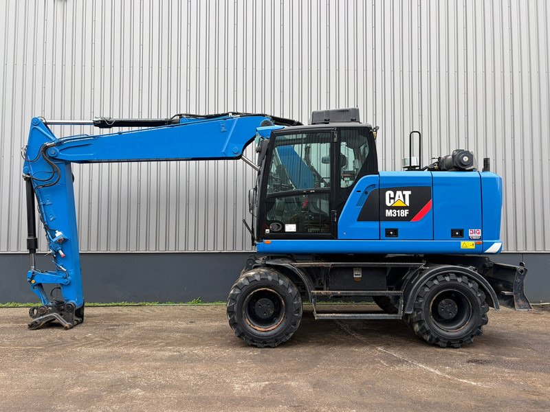 Caterpillar M318F - Колесен багер: снимка 1 Caterpillar M318F - Колесен багер: снимка 1