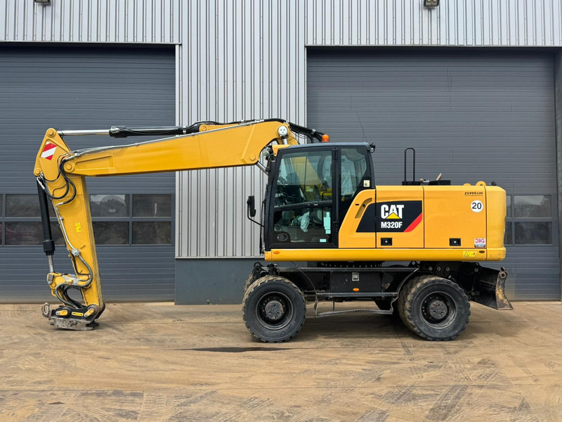Caterpillar M320F - Колесен багер: снимка 1 Caterpillar M320F - Колесен багер: снимка 1