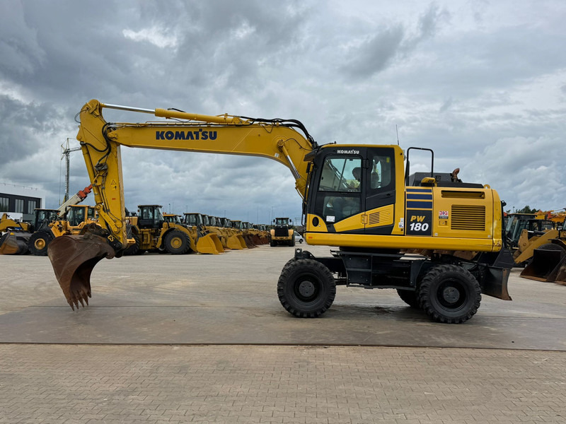 Komatsu PW180-11 - Колесен багер: снимка 1 Komatsu PW180-11 - Колесен багер: снимка 1