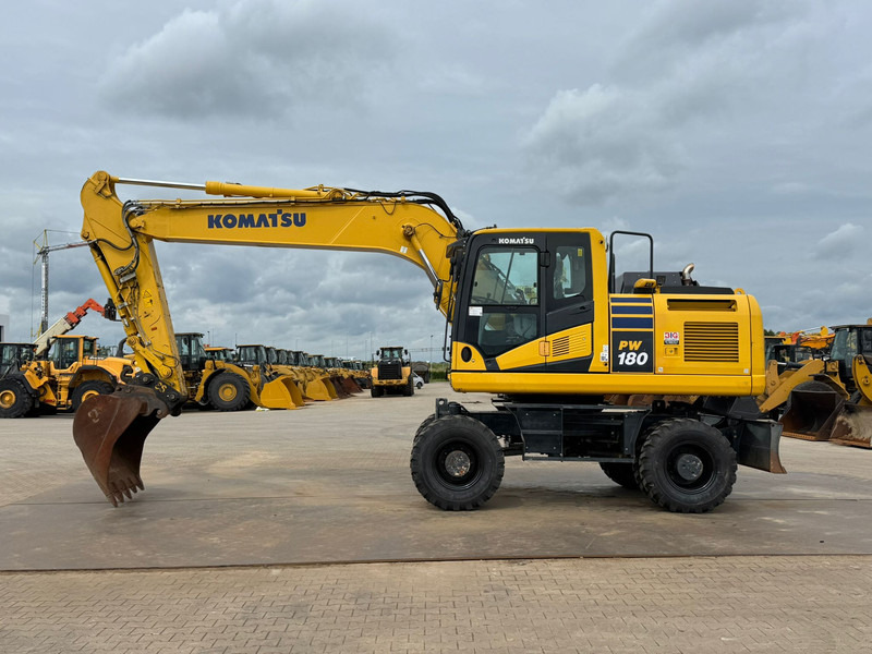 Komatsu PW180-11 - Колесен багер: снимка 1 Komatsu PW180-11 - Колесен багер: снимка 1