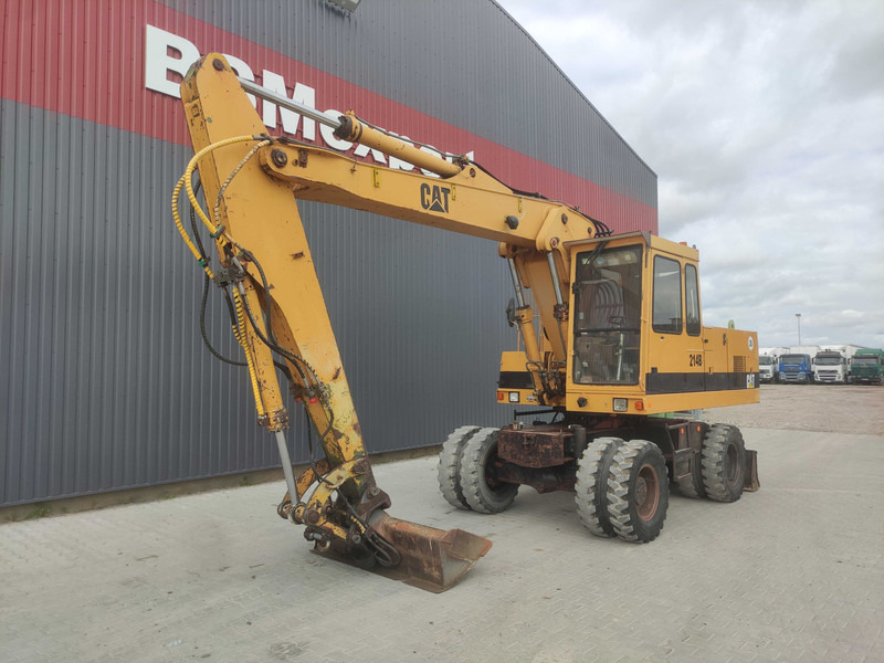 Caterpillar 214 B wheel excavator - Колесен багер: снимка 2 Caterpillar 214 B wheel excavator - Колесен багер: снимка 2