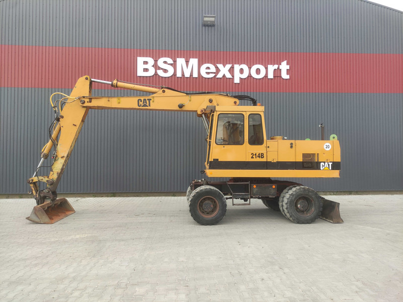 Caterpillar 214 B wheel excavator - Колесен багер: снимка 1 Caterpillar 214 B wheel excavator - Колесен багер: снимка 1