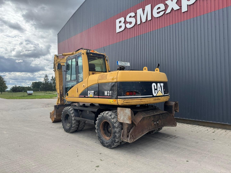 Caterpillar M 315 C - Колесен багер: снимка 4 Caterpillar M 315 C - Колесен багер: снимка 4