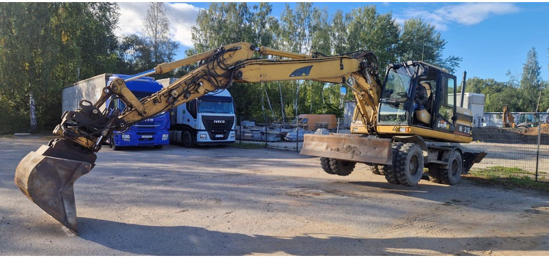 Caterpillar M 315 Rototilt - Колесен багер: снимка 4 Caterpillar M 315 Rototilt - Колесен багер: снимка 4