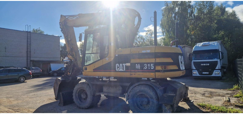 Caterpillar M 315 Rototilt - Колесен багер: снимка 3 Caterpillar M 315 Rototilt - Колесен багер: снимка 3