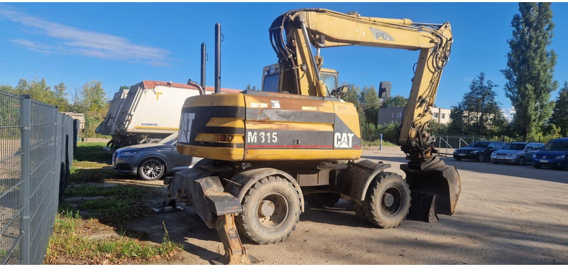 Caterpillar M 315 Rototilt - Колесен багер: снимка 2 Caterpillar M 315 Rototilt - Колесен багер: снимка 2