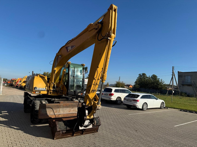 Caterpillar M 316 C - Колесен багер: снимка 2 Caterpillar M 316 C - Колесен багер: снимка 2