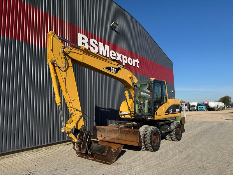 Caterpillar M 316 C - Колесен багер: снимка 1 Caterpillar M 316 C - Колесен багер: снимка 1