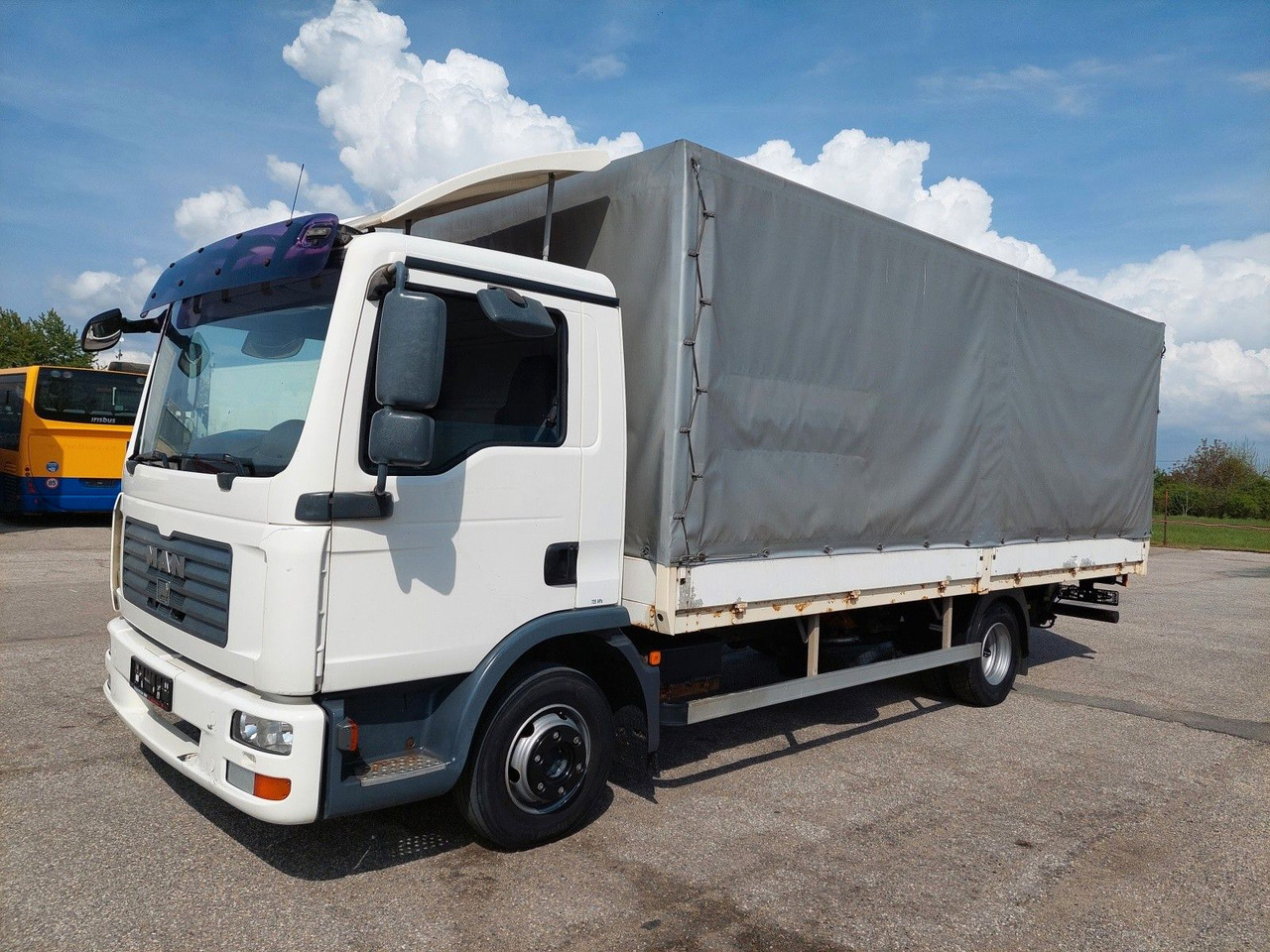MAN TGL 8.180 4X2 BL - Камион с брезент: снимка 1 MAN TGL 8.180 4X2 BL - Камион с брезент: снимка 1