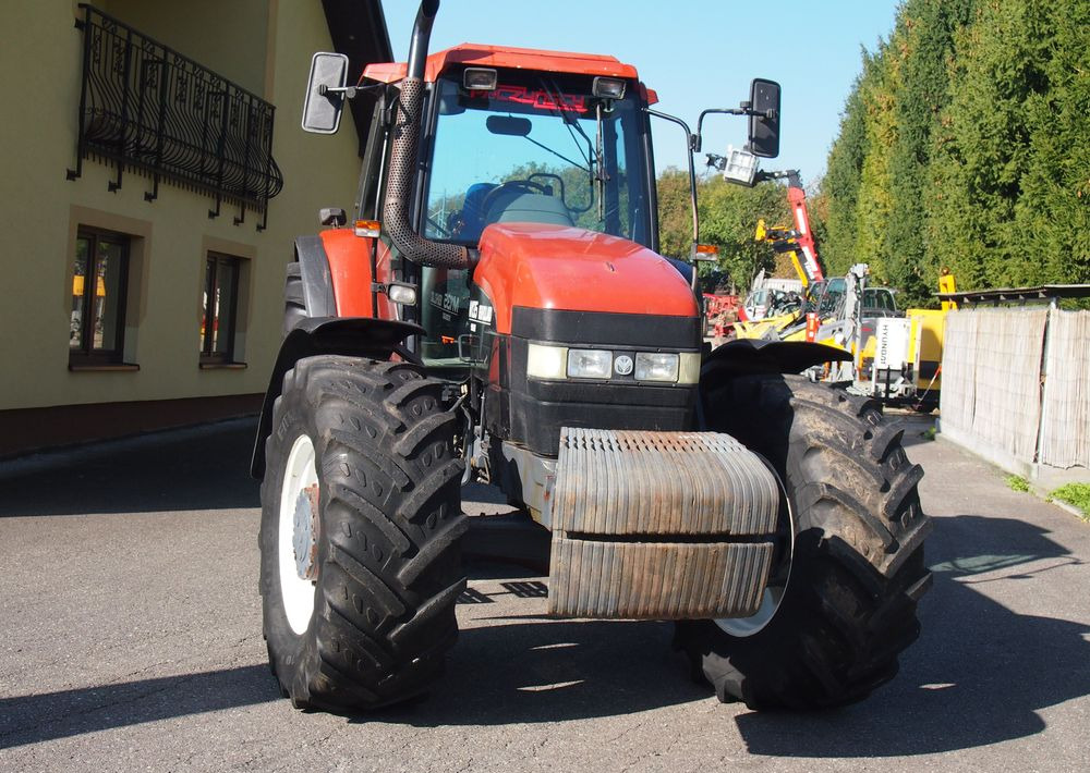 Ciągnik New Holland NH M 135 1998 NEW HOLLAND TM M135 - Трактор: снимка 4 Ciągnik New Holland NH M 135 1998 NEW HOLLAND TM M135 - Трактор: снимка 4