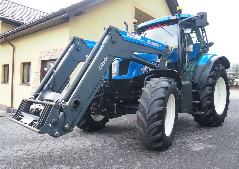 Трактор Ciągnik New Holland NH TS125A 6 cylindrów 2004 Ciągnik rolniczy New Holland TS125A: снимка 14 Трактор Ciągnik New Holland NH TS125A 6 cylindrów 2004 Ciągnik rolniczy New Holland TS125A: снимка 14