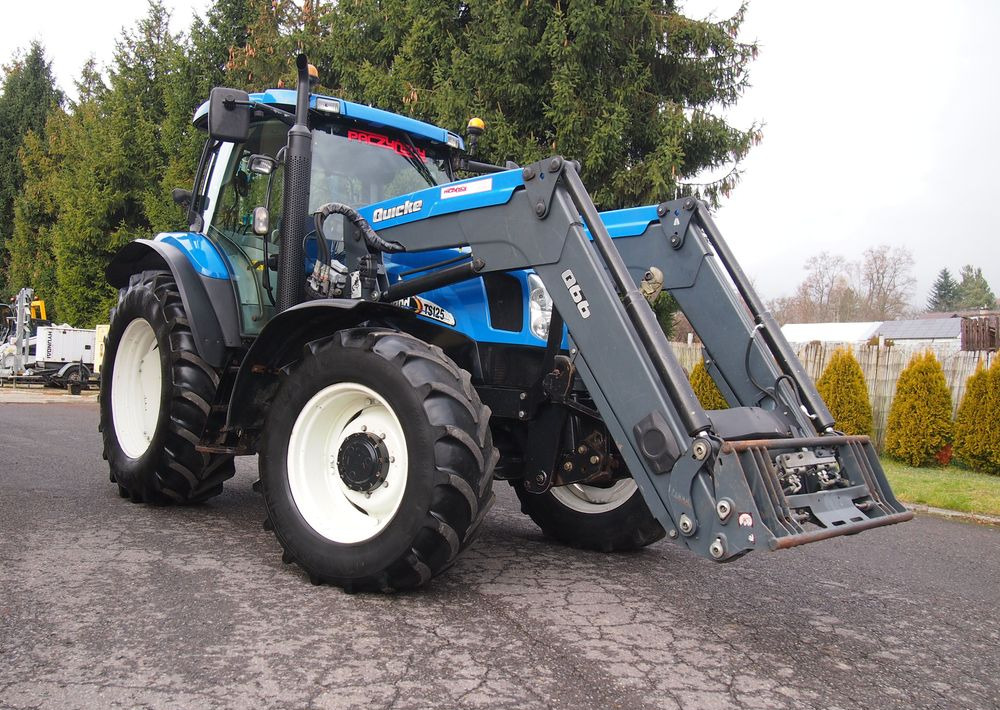 Ciągnik New Holland NH TS125A 6 cylindrów 2004 Ciągnik rolniczy New Holland TS125A - Трактор: снимка 2 Ciągnik New Holland NH TS125A 6 cylindrów 2004 Ciągnik rolniczy New Holland TS125A - Трактор: снимка 2