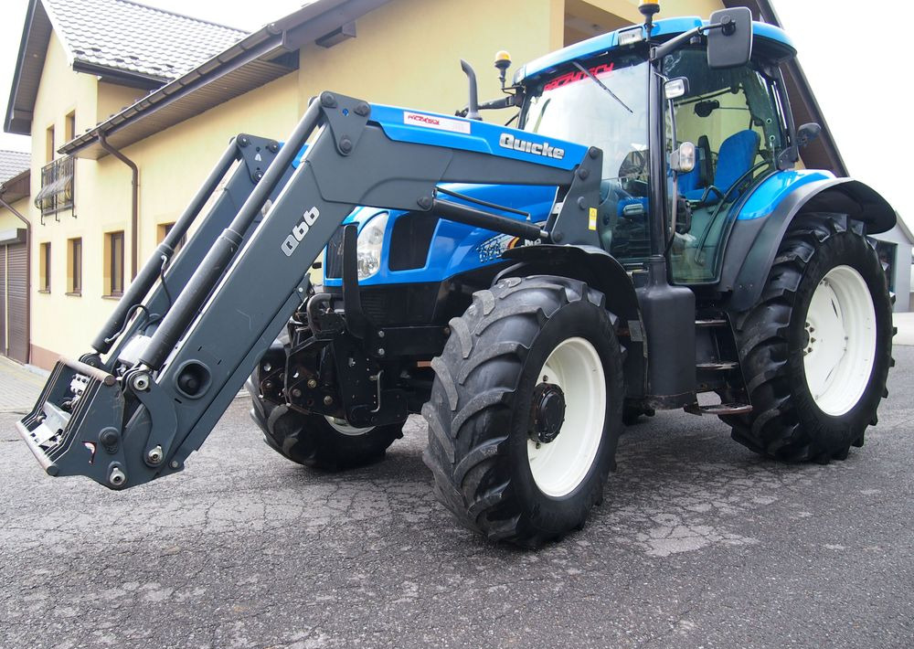 Ciągnik New Holland NH TS125A 6 cylindrów 2004 Ciągnik rolniczy New Holland TS125A - Трактор: снимка 1 Ciągnik New Holland NH TS125A 6 cylindrów 2004 Ciągnik rolniczy New Holland TS125A - Трактор: снимка 1