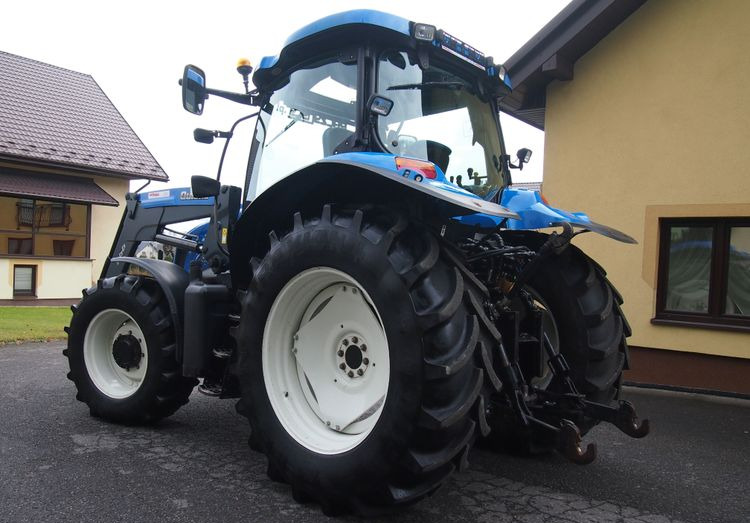 Трактор Ciągnik New Holland NH TS125A 6 cylindrów 2004 Ciągnik rolniczy New Holland TS125A: снимка 12 Трактор Ciągnik New Holland NH TS125A 6 cylindrów 2004 Ciągnik rolniczy New Holland TS125A: снимка 12