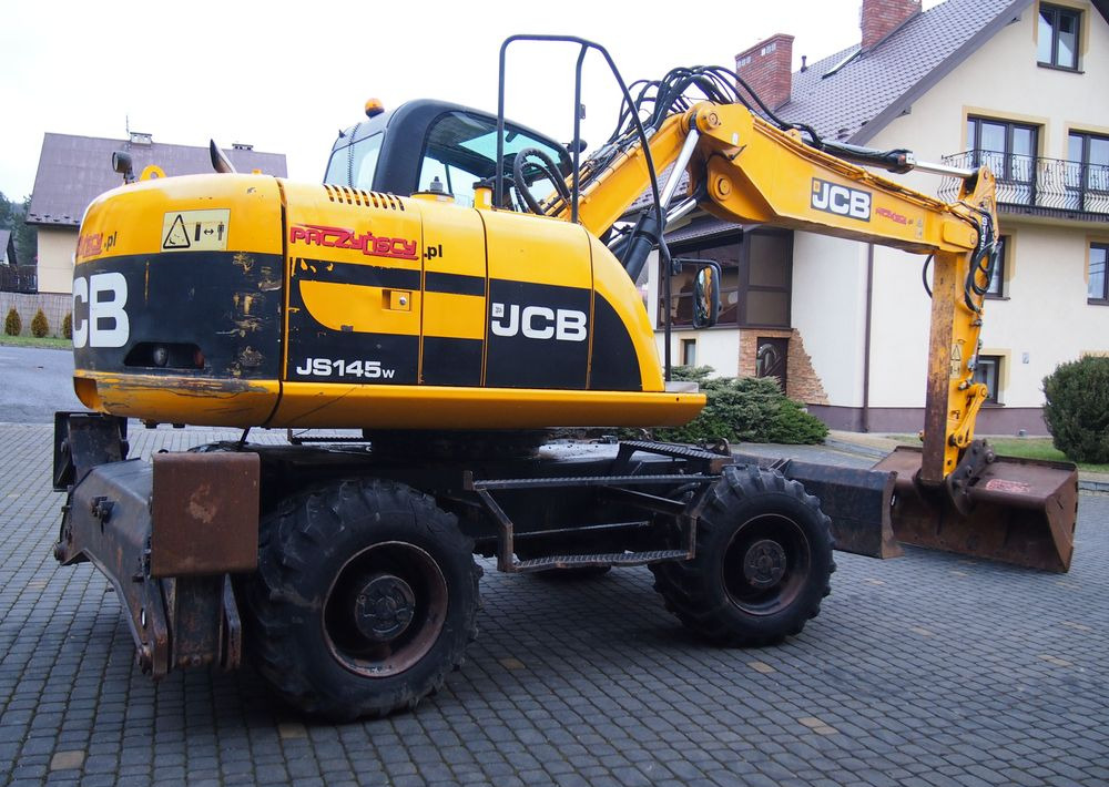 Koparka kołowa JCB JS145W 2011 Koparka JCB - Колесен багер: снимка 2 Koparka kołowa JCB JS145W 2011 Koparka JCB - Колесен багер: снимка 2