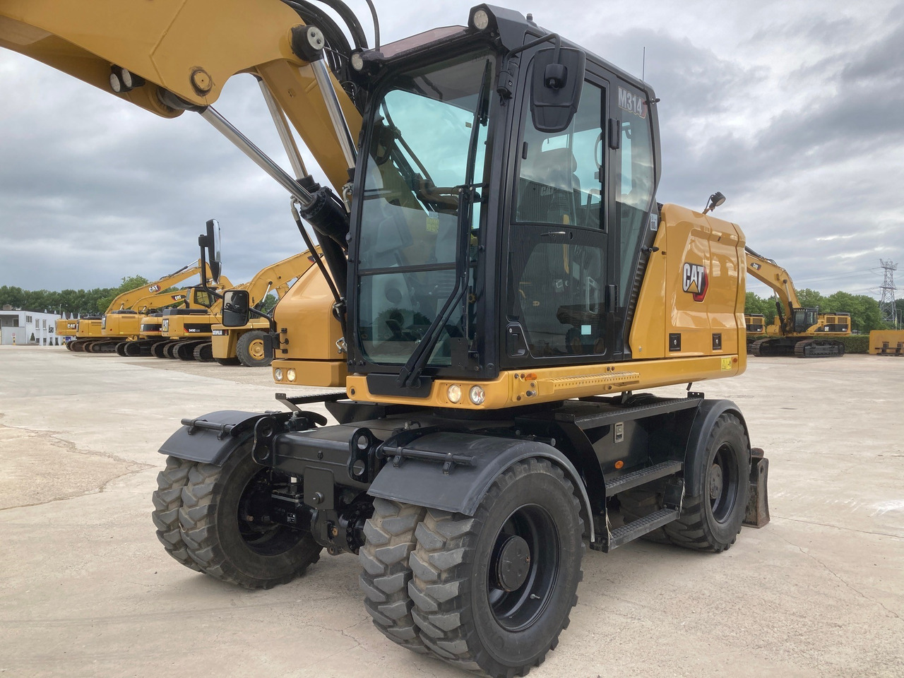 CATERPILLAR M314 - Колесен багер: снимка 2 CATERPILLAR M314 - Колесен багер: снимка 2