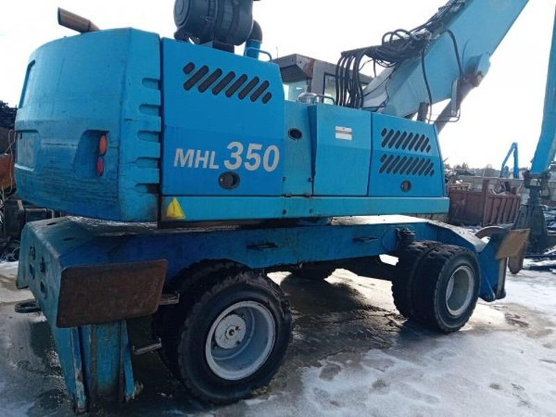 Fuchs MHL350 - Багер за манипулиране на материали: снимка 4 Fuchs MHL350 - Багер за манипулиране на материали: снимка 4