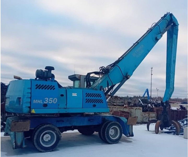 Fuchs MHL350 - Багер за манипулиране на материали: снимка 1 Fuchs MHL350 - Багер за манипулиране на материали: снимка 1