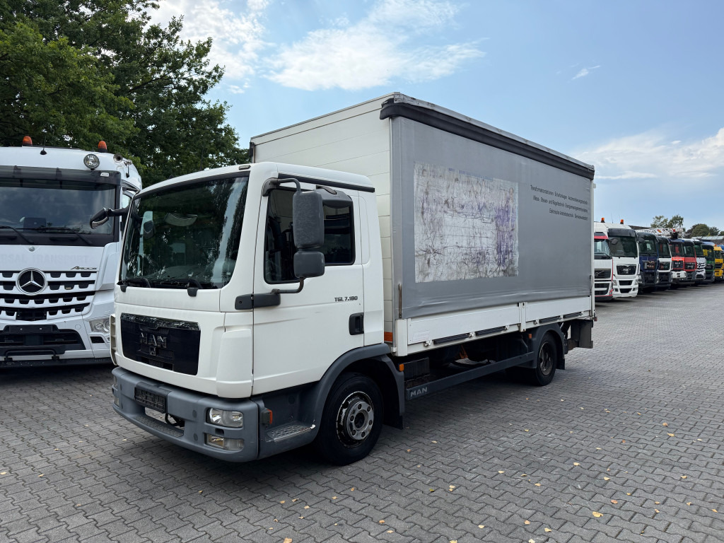 MAN TGL 7.180 4X2 BL 1500Kg Ladebordwand - Камион с брезент: снимка 1 MAN TGL 7.180 4X2 BL 1500Kg Ladebordwand - Камион с брезент: снимка 1