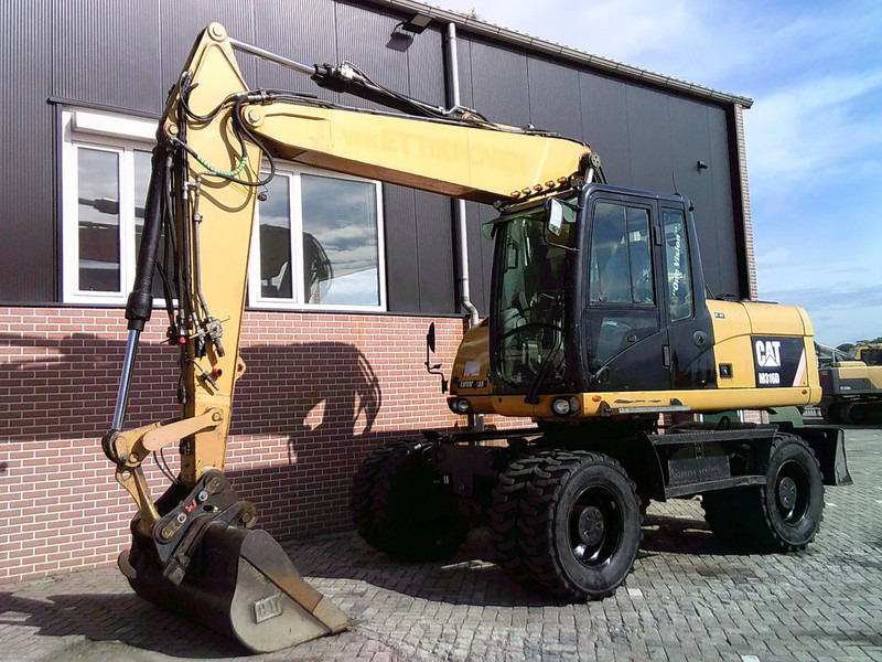 Caterpillar M316D - Колесен багер: снимка 1 Caterpillar M316D - Колесен багер: снимка 1