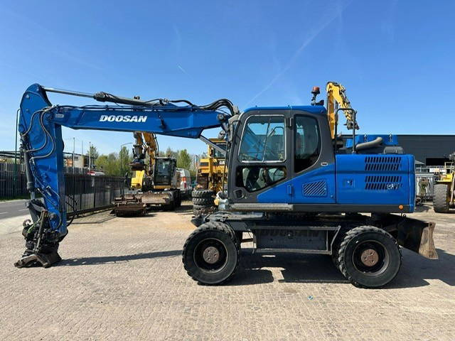 Doosan DX170W - Колесен багер: снимка 1 Doosan DX170W - Колесен багер: снимка 1