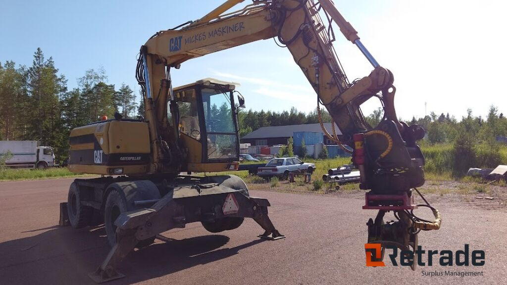 Hjulgrävare Caterpillar M312-4X4 - Колесен багер: снимка 2 Hjulgrävare Caterpillar M312-4X4 - Колесен багер: снимка 2