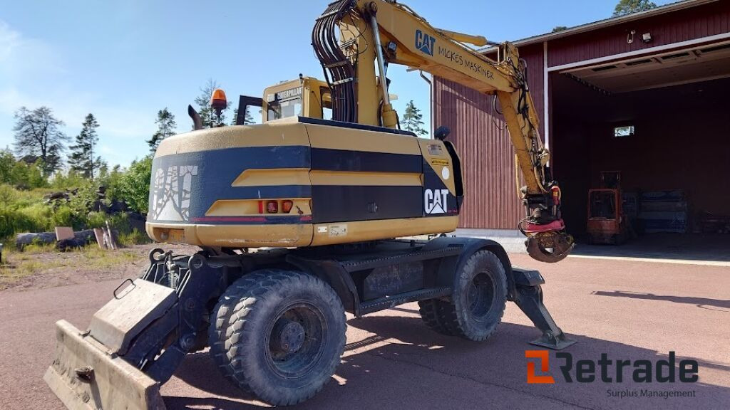 Hjulgrävare Caterpillar M312-4X4 - Колесен багер: снимка 4 Hjulgrävare Caterpillar M312-4X4 - Колесен багер: снимка 4