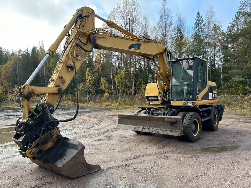 Caterpillar M312 Engcon EC20 tiltrotator - Колесен багер: снимка 1 Caterpillar M312 Engcon EC20 tiltrotator - Колесен багер: снимка 1