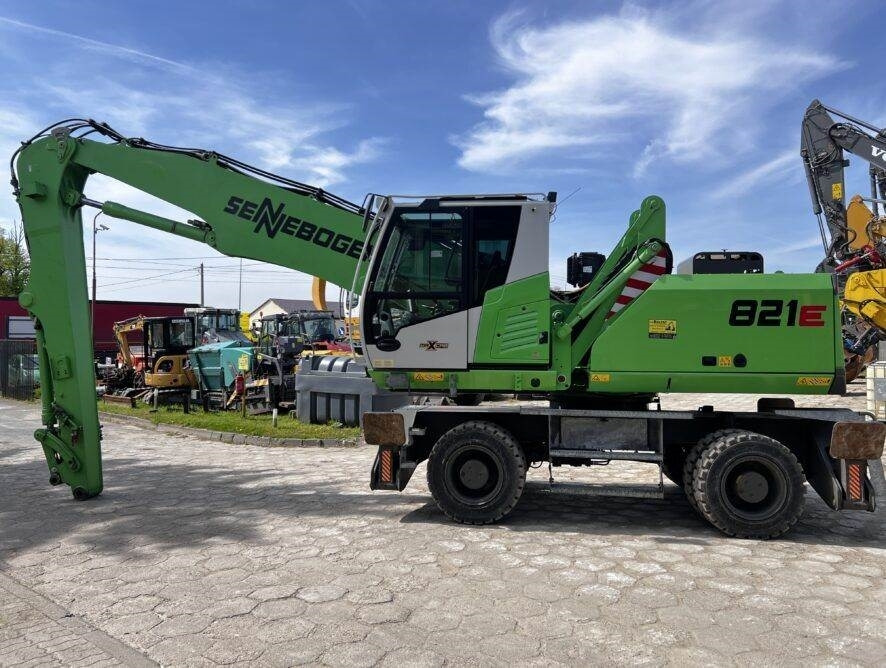 Sennebogen 821 K10 ULM - Багер за манипулиране на материали: снимка 1 Sennebogen 821 K10 ULM - Багер за манипулиране на материали: снимка 1
