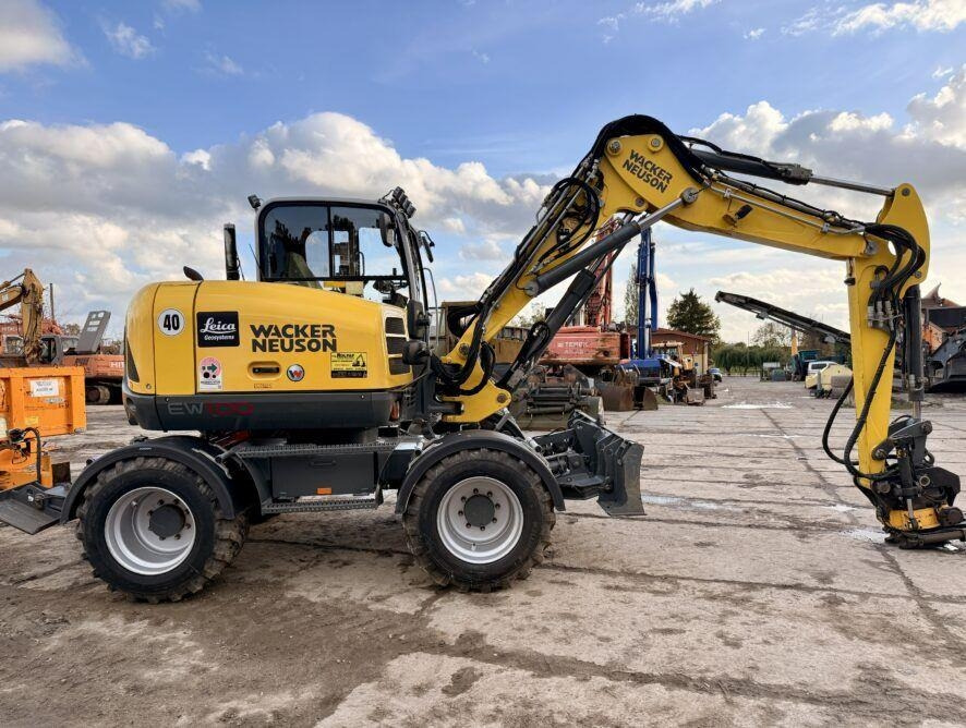 Wacker Neuson EW100 - Колесен багер: снимка 1 Wacker Neuson EW100 - Колесен багер: снимка 1