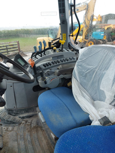Трактор 2011 New Holland T7040: снимка 14