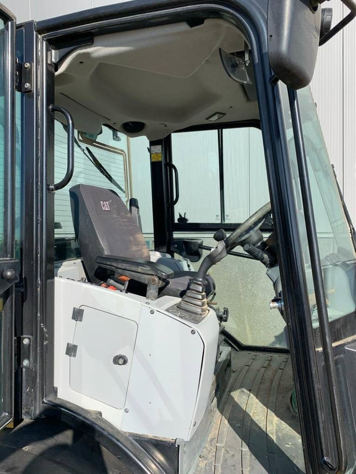 Колесен товарач CAT 906: снимка 13