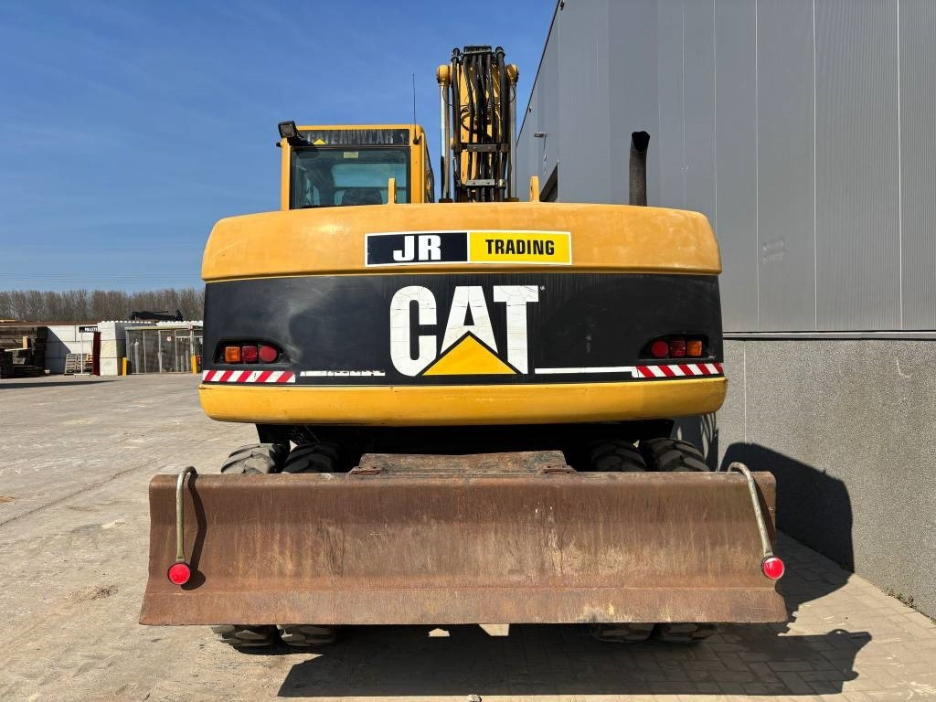 CAT M 313 C (Low verified hours) - Колесен багер: снимка 4 CAT M 313 C (Low verified hours) - Колесен багер: снимка 4