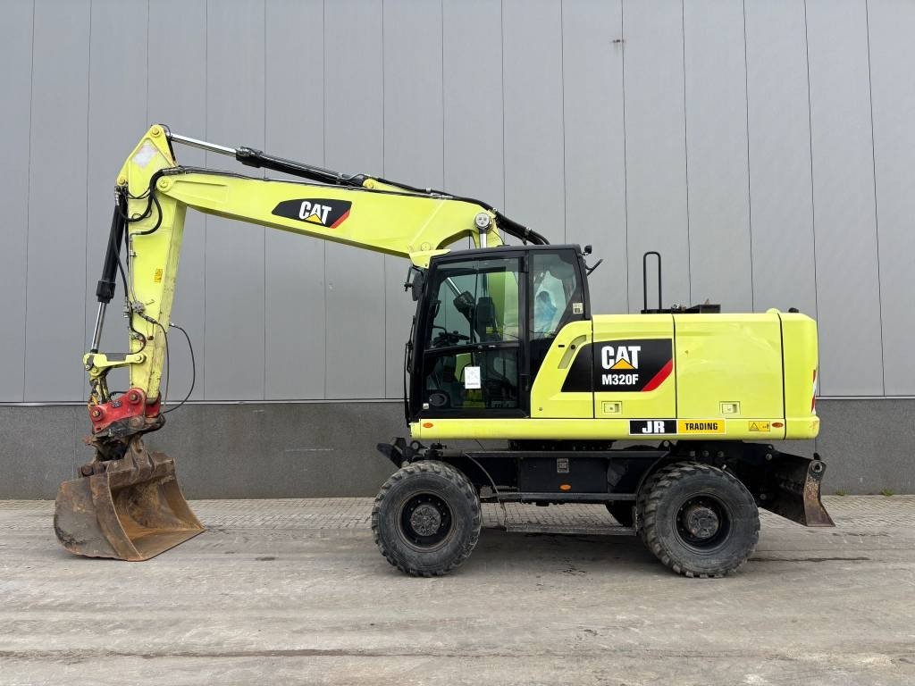 CAT M 320 F - Колесен багер: снимка 1 CAT M 320 F - Колесен багер: снимка 1
