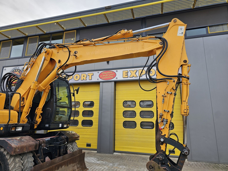 Колесен багер Hyundai R140W-7A: снимка 8