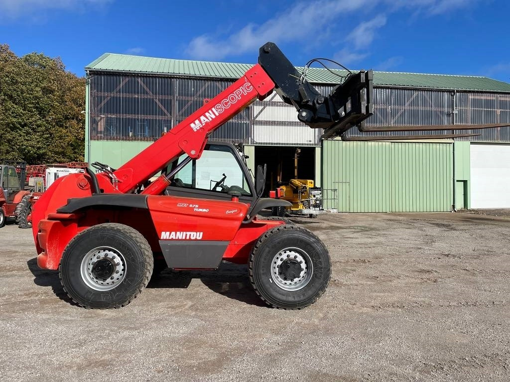 Телескопичен товарач Manitou MVT 675: снимка 9